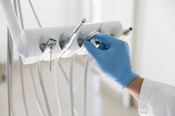 Professional Tooth Extraction technician working in Greenville, SC
